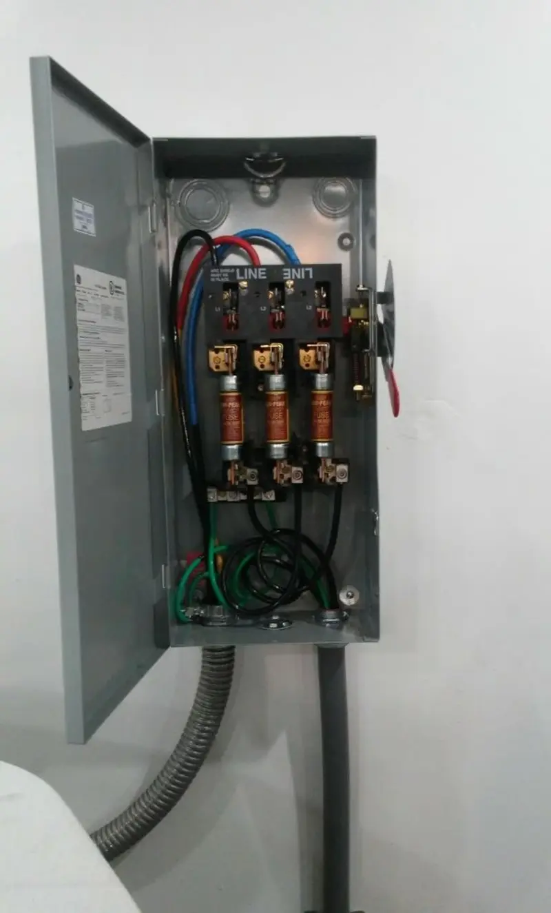 Three-phase disconnect switch installed for Smoke Detector Installation in Big Flats